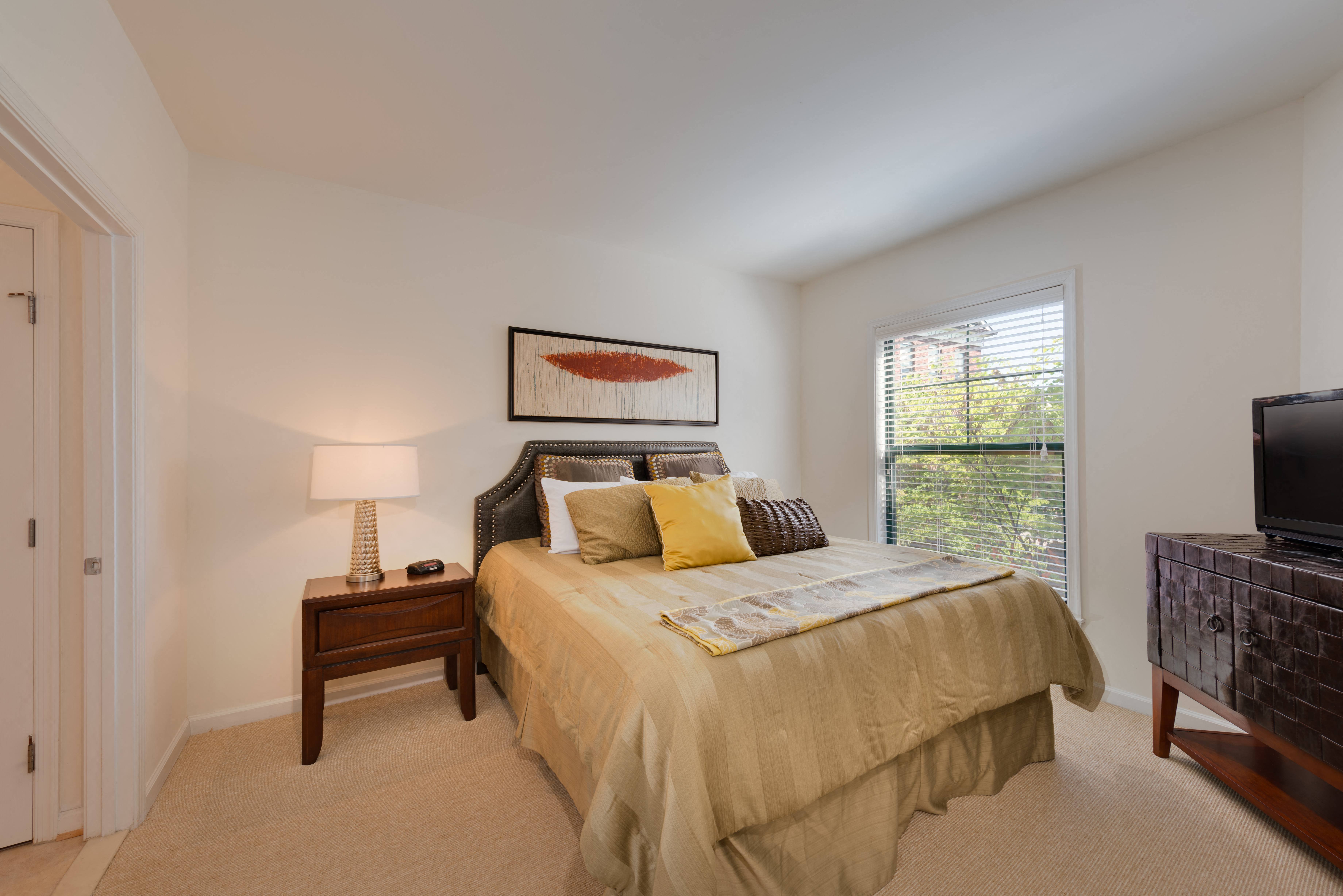 Spacious bedrooms with large windows for natural light